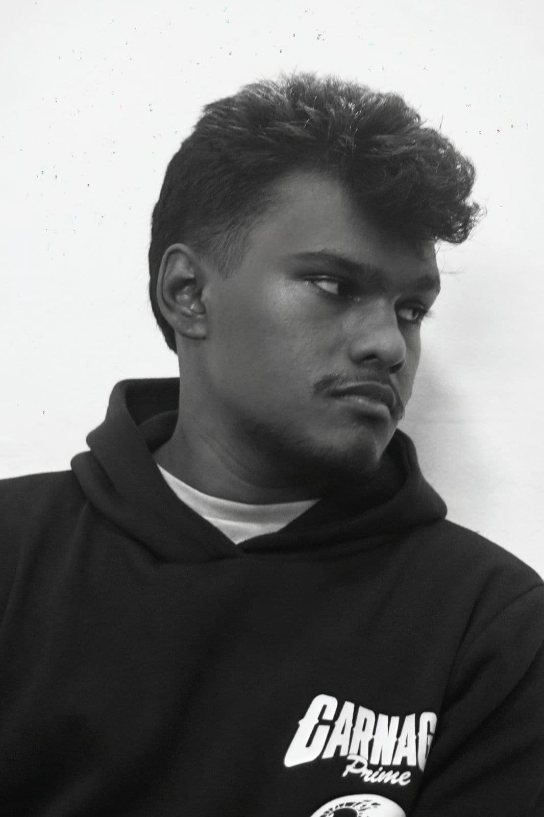 Pulindu Pansilu, photographed in black and white.
